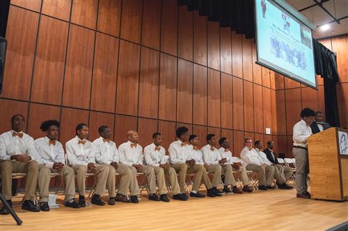 An image of all of the inductees siting down side by side during the ceremony. 